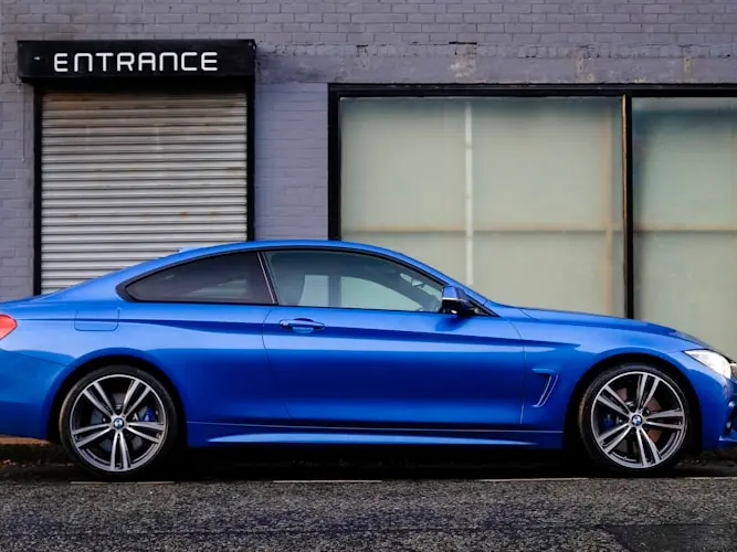 A clean car parked curbside, ready to be appraised
